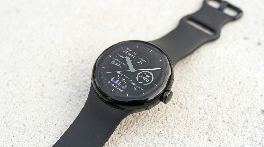 Wear OS smartwatch showing heart rate, sleep, steps, and activity metrics